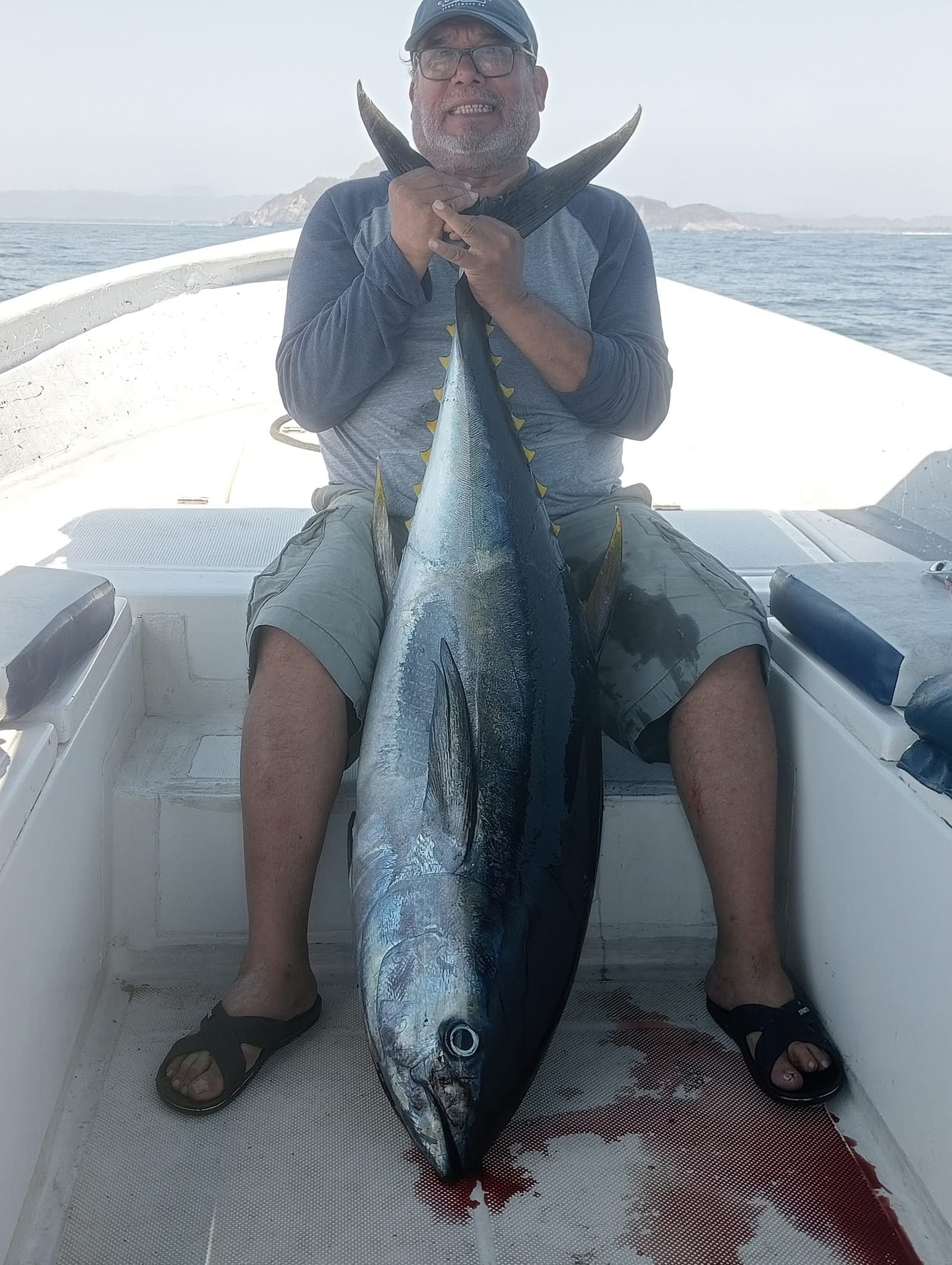 Fishing charter guests with their catch